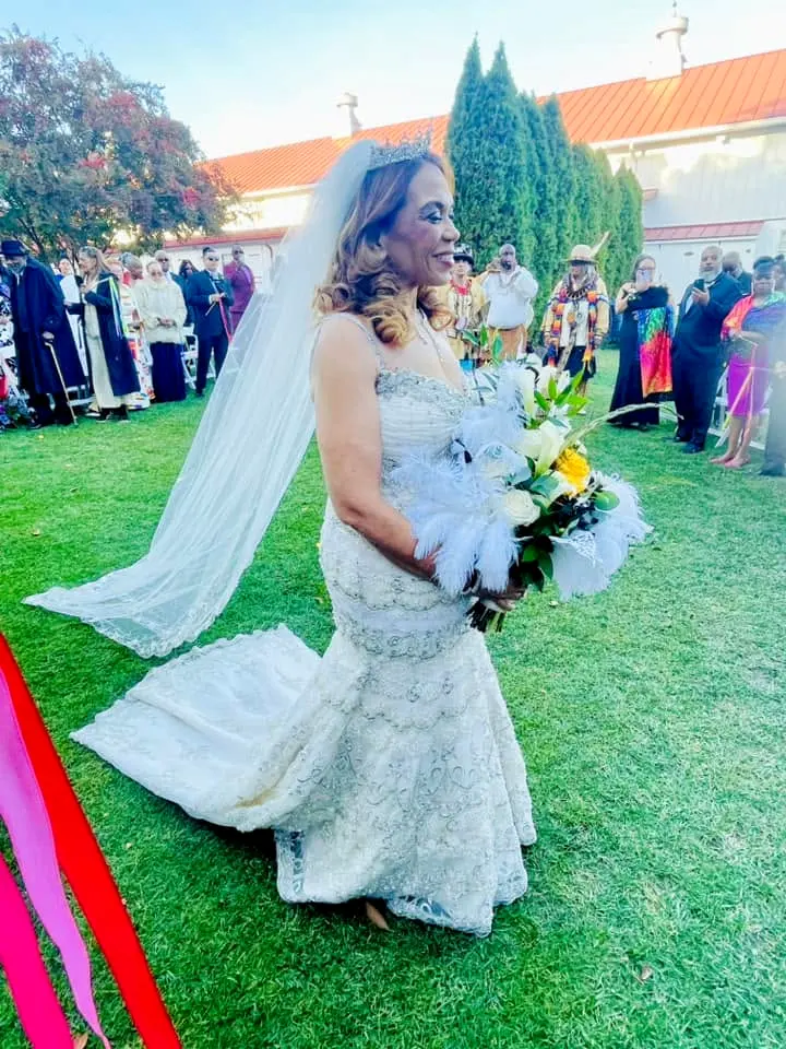 An outdoor wedding, the table working till the end