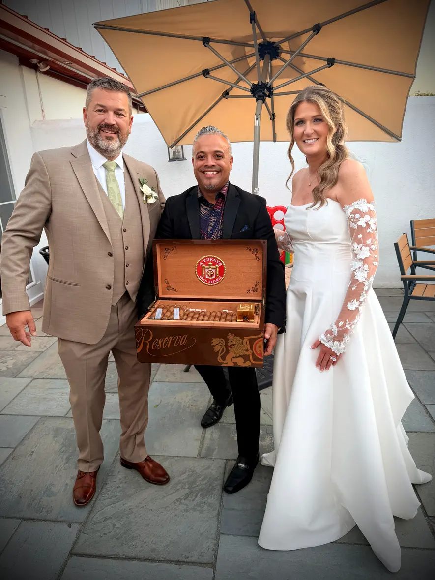 A courtyard wedding, and the bride at the table